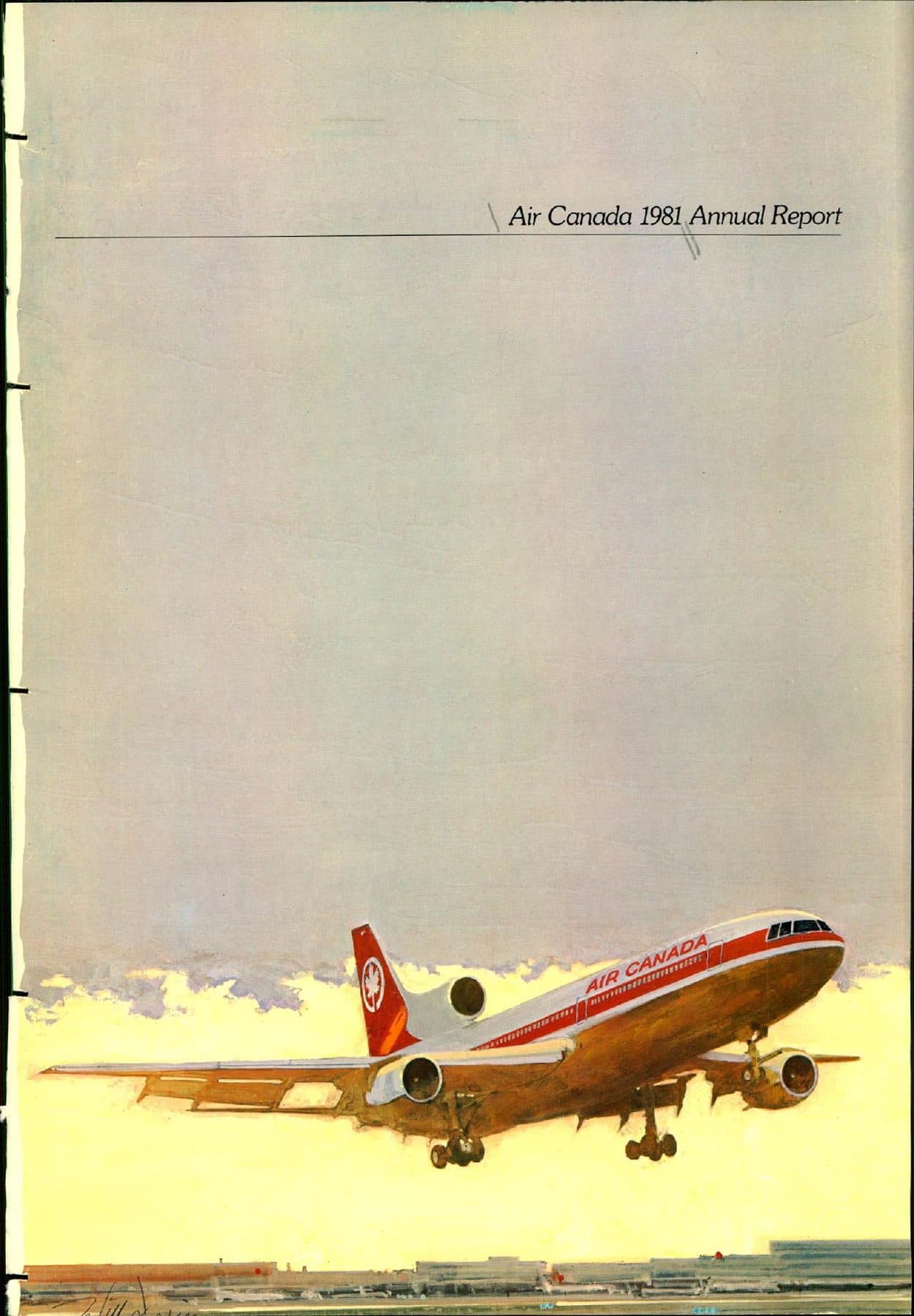 L-1011 taking off, gear down, maple-leaf tail.