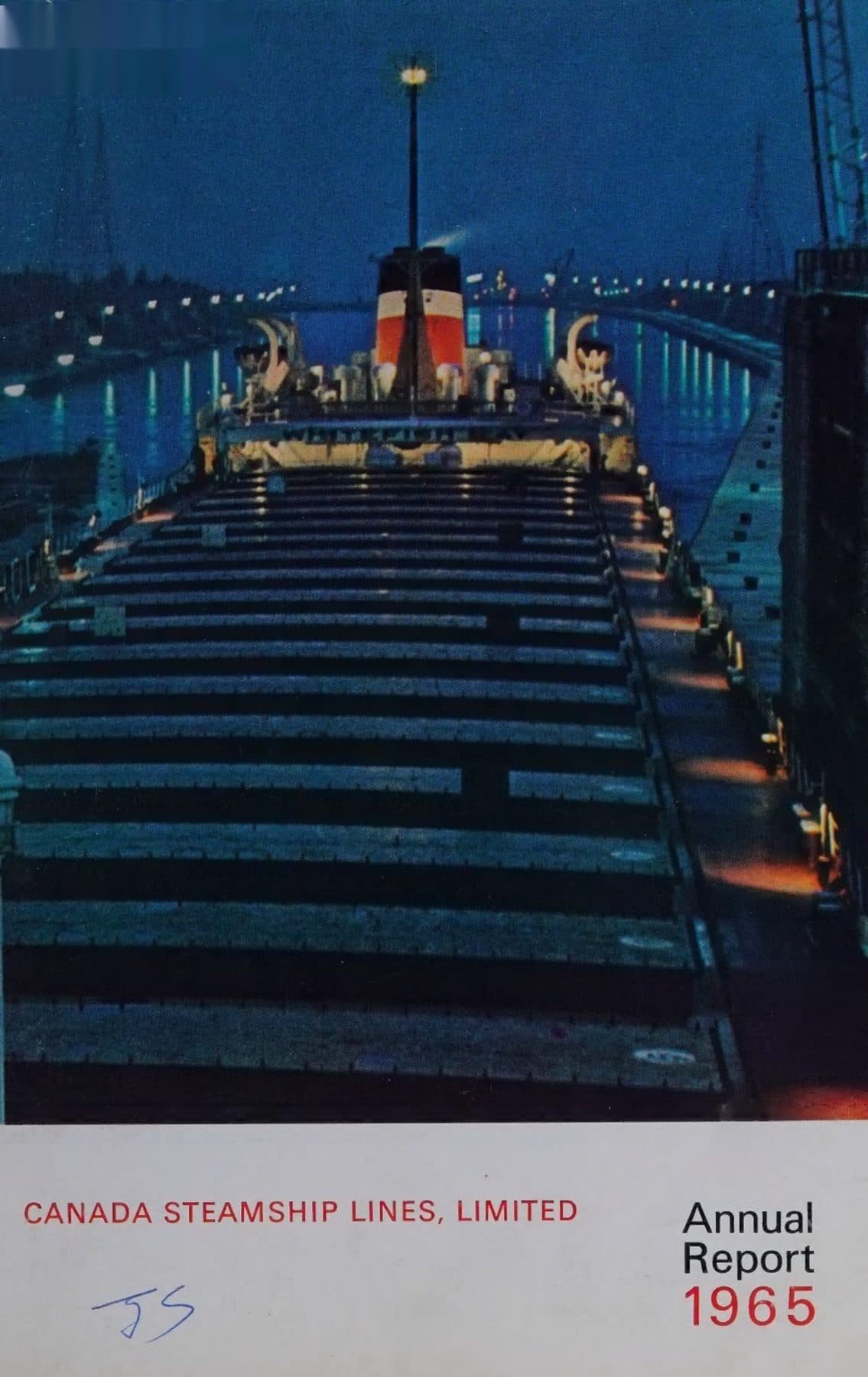 Great Lakes freighter lit at night.