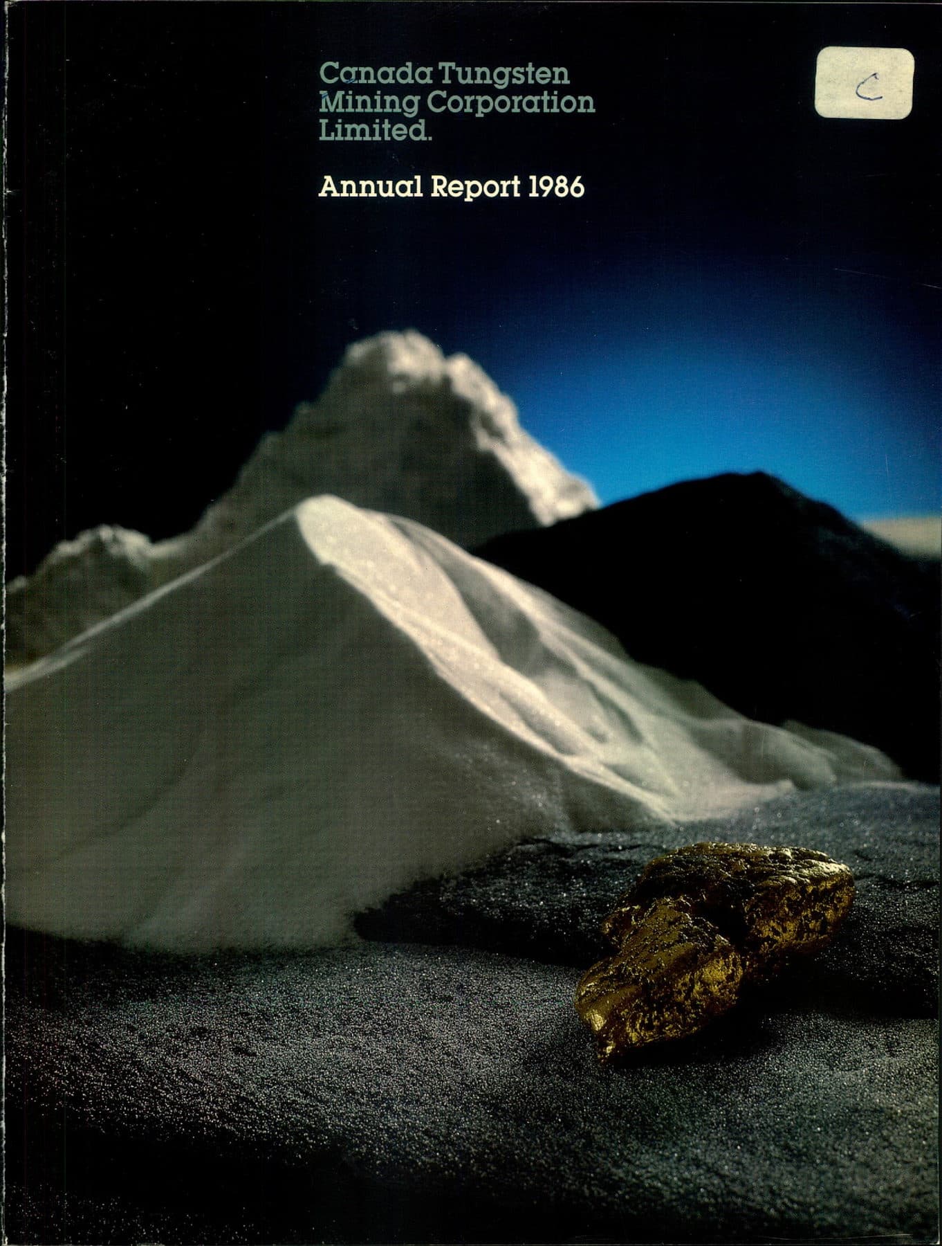 Studio mounds of white powder and dark ore with golden metallic rocks in the foreground.