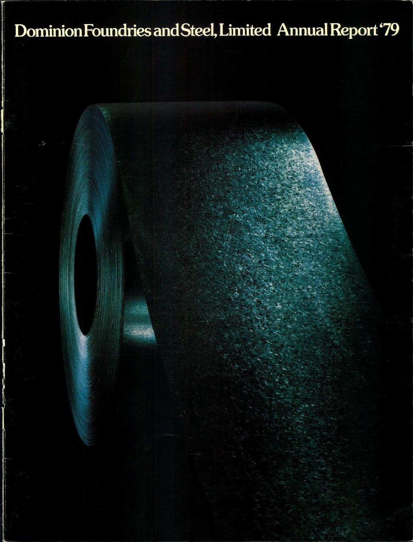 A giant coil of sheet steel, surface like a planet.