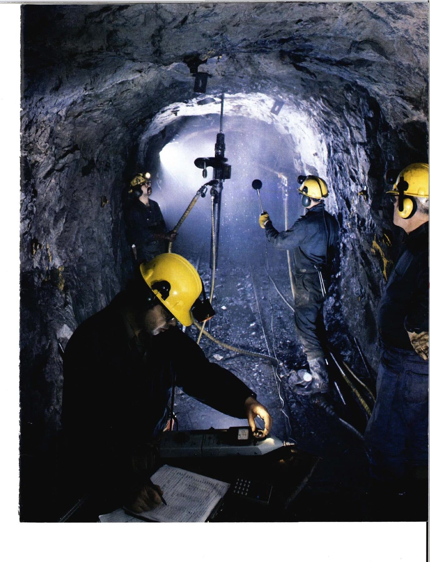 Underground drill crew, jumbo and noise meter.